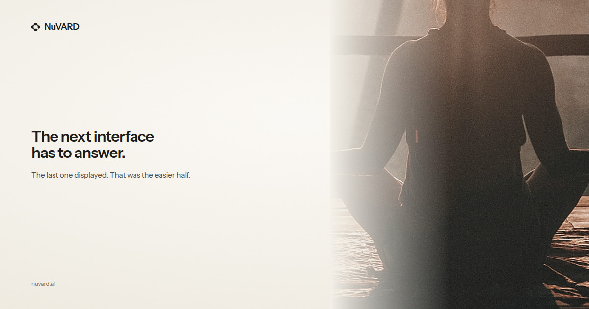 A figure seated at the water at dawn, backlit. Headline: the next interface has to answer.