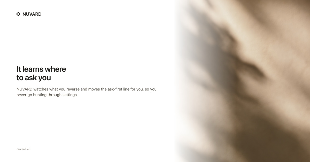 A warm out-of-focus shadow falling across a pale wall. Headline: it learns where to ask you.